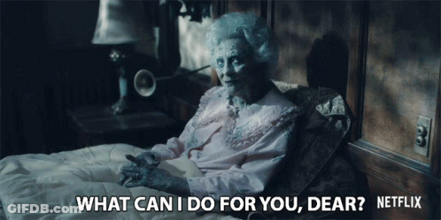 Elderly Woman In Bed Saying What Can I Do For You Dear GIF