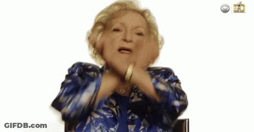 Elderly Woman In Blue Jacket Making A Face GIF