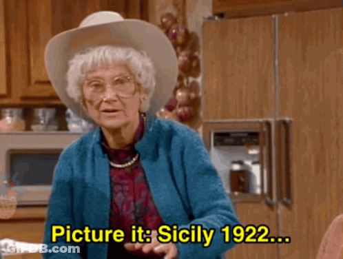 Elderly Woman In Blue Sweater Says Picture It Sicily 1922 GIF