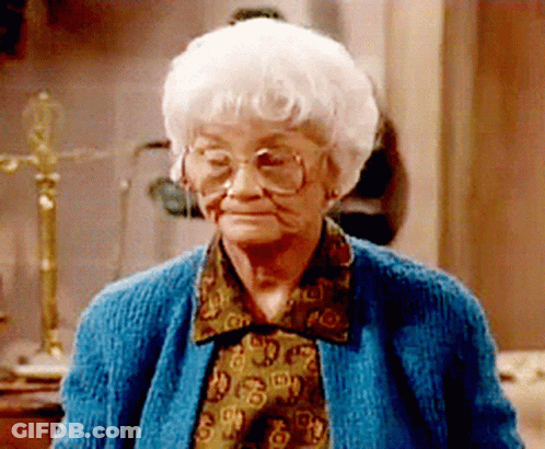 Elderly Woman In Blue Sweater GIF