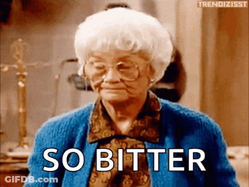 Elderly Woman In Glasses And Blue Sweater Saying So Bitter GIF