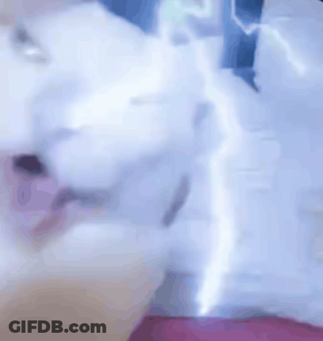 Elderly Woman In Scarf Making Funny Face GIF