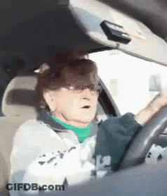 Elderly Woman Making Funny Face Driving GIF