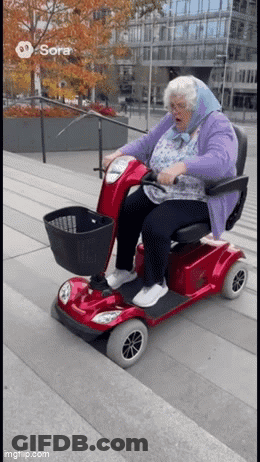 Elderly Woman Riding Red Scooter Down Stairs GIF