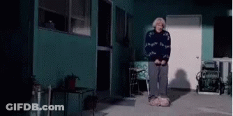 Elderly Woman Standing With Shovel GIF