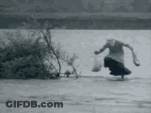Elderly Woman Walking On Frozen Lake GIF