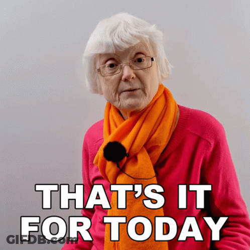 Elderly Woman Wearing Glasses And Orange Scarf GIF