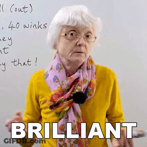 Elderly Woman With Glasses And Scarf Saying Brilliant GIF