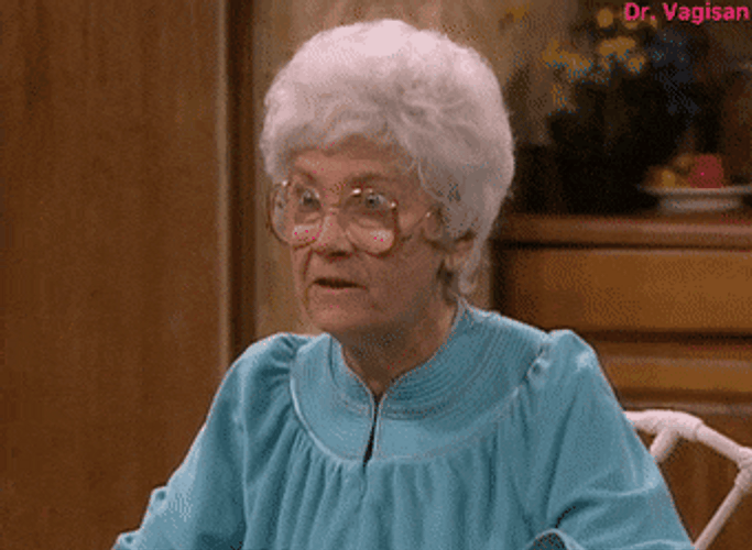 Elderly Woman With Glasses Blank Stare GIF
