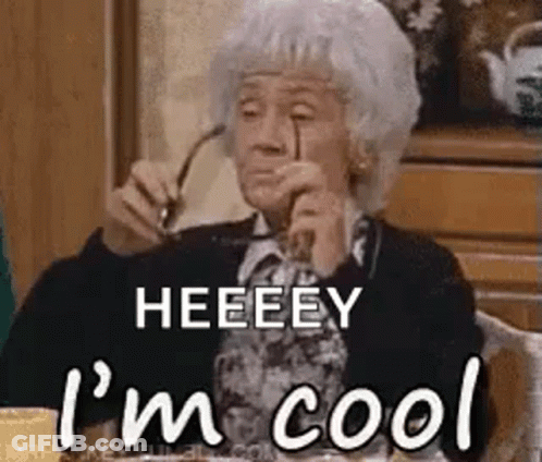 Elderly Woman With Glasses Saying Heeeey I'm Cool GIF