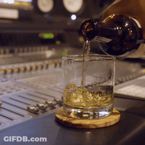Elegant Man Drinking Rum GIF