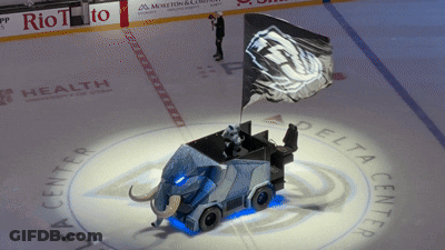 Elephant Shaped Vehicle On Ice In Front Of Delta Center Sign GIF