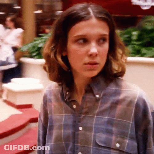 Eleven Smiling Looking Around Stranger Things GIF