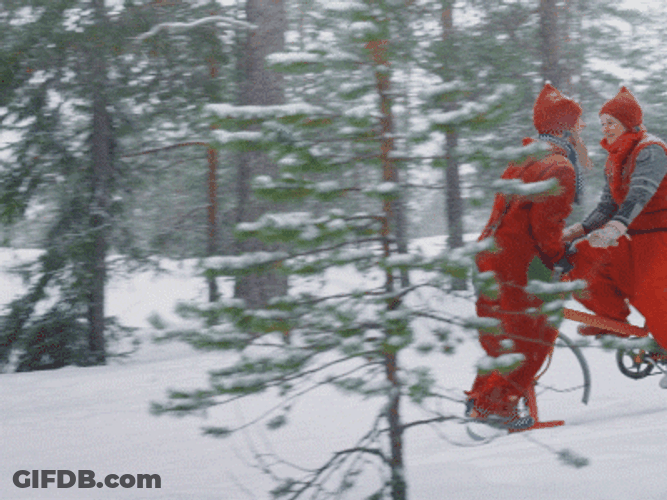 Elf Santa Riding Bicycle GIF