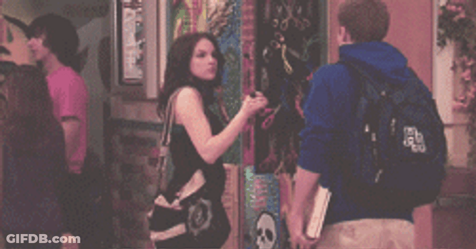 Elizabeth Gillies Talking To Her Classmate GIF