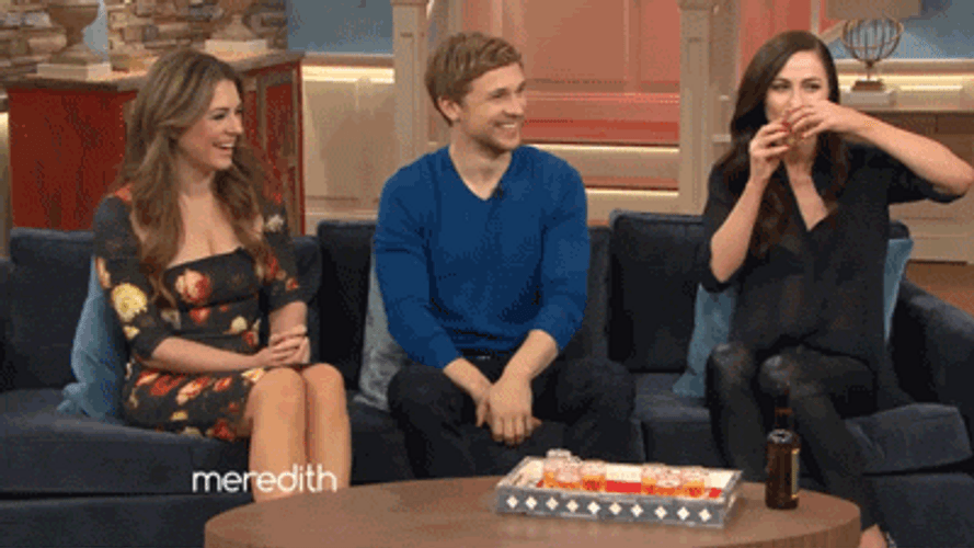 Elizabeth Hurley Drinking On Stage GIF