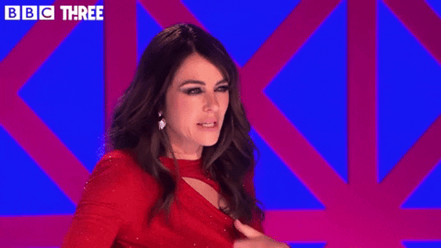 Elizabeth Hurley Explaining GIF