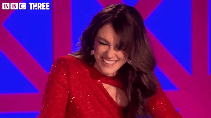Elizabeth Hurley Laughing Alone GIF