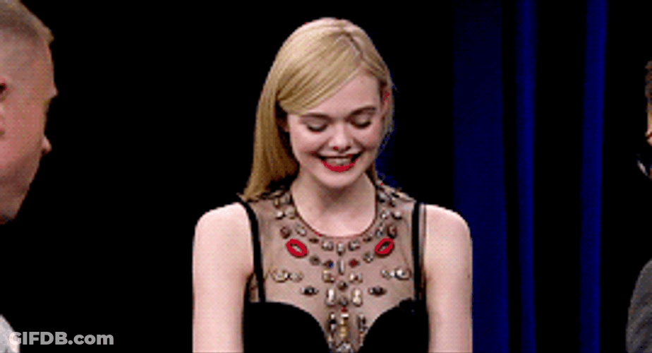 Elle Fanning Reading Questions Tonight GIF