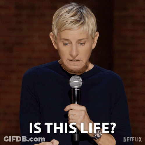 Ellen Degeneres Is Holding A Shure Microphone And Says " Is This Life " GIF