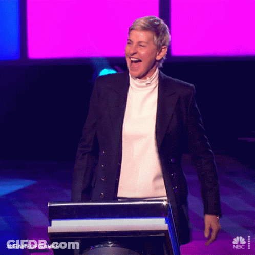 Ellen Degeneres Is Laughing While Standing At A Podium For Game Of Games On Nbc GIF
