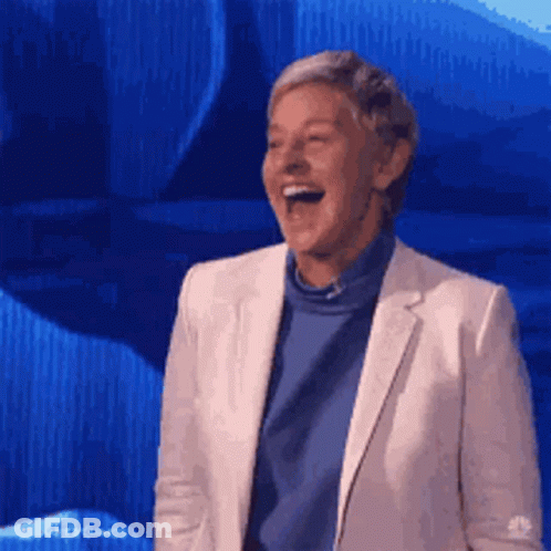 Ellen Degeneres Is Laughing While Wearing A White Jacket GIF