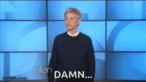 Ellen Degeneres Making Face Against Blue Wall GIF