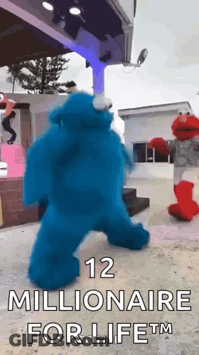 Elmo And Cookie Monster Dancing In Front Of 12 Millionaire For Life Sign GIF
