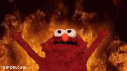 Elmo Before Wall Of Fire GIF