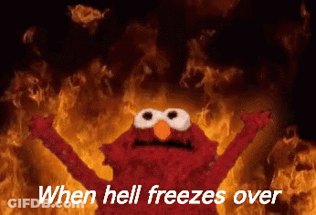 Elmo By Fire Saying When Hell Freezes Over GIF