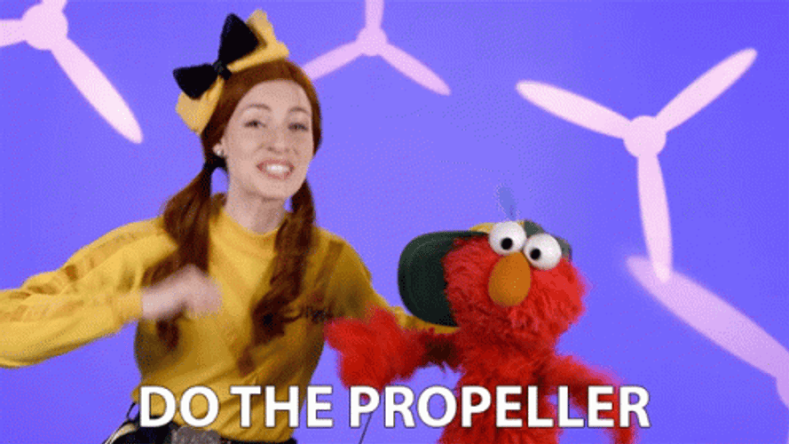 Elmo Dancing And Emma Watkins Do The Propeller GIF