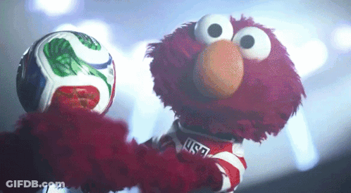 Elmo From Sesame Street Holding Soccer Ball GIF