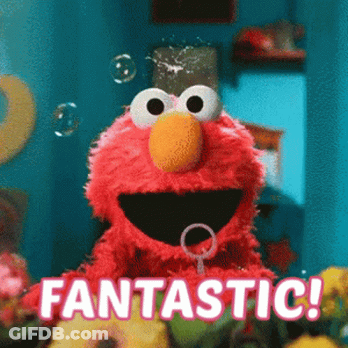 Elmo From Sesame Street Is Blowing Soap Bubbles And Saying Fantastic . GIF