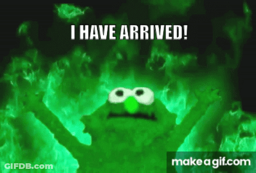 Elmo From Sesame Street Is Glowing In The Dark And Saying I Have Arrived . GIF