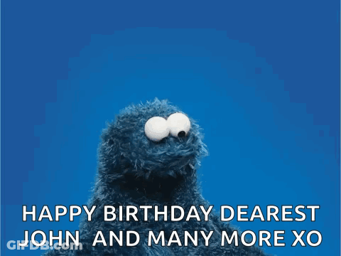 Elmo From Sesame Street Is Holding A Red Heart And Wishing John And Many More Xo . GIF