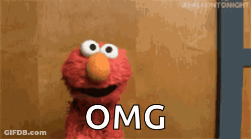 Elmo From Sesame Street Is Making A Funny Face And Says Omg . GIF