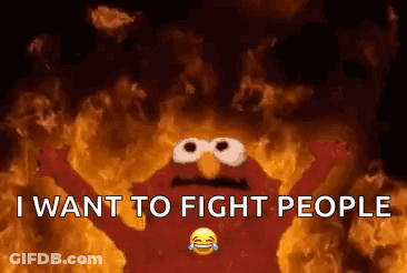 Elmo From Sesame Street Is On Fire With The Words `` I Want To Fight People '' . GIF