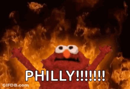 Elmo From Sesame Street Is Screaming In Front Of A Fire And The Words Philly !!! GIF