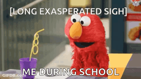 Elmo From Sesame Street Is Sitting At A Table With A Purple Cup And A Straw . GIF