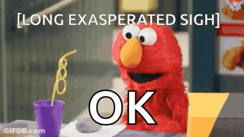 Elmo From Sesame Street Is Sitting At A Table With A Straw In A Cup . GIF
