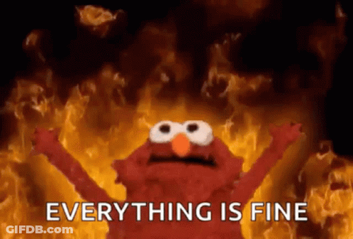 Elmo From Sesame Street Is Standing In Front Of A Fire With The Words `` Everything Is Fine '' . GIF