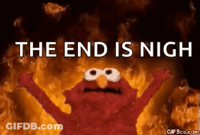 Elmo From Sesame Street Is Standing In Front Of A Fire With The Words `` The End Is Nigh '' Written On It . GIF