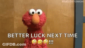 Elmo From Sesame Street Is Standing In Front Of A Wall And Says `` Better Luck Next Time '' . GIF