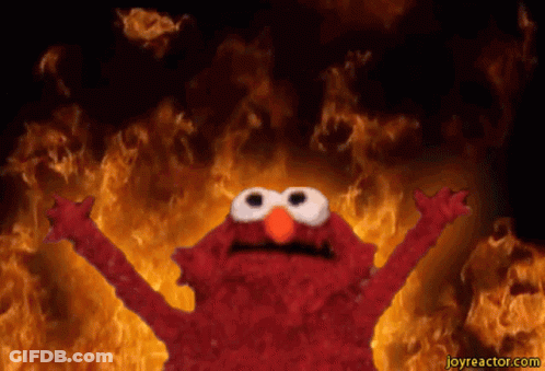 Elmo From Sesame Street Is Surrounded By Fire GIF