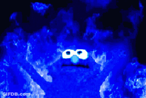 Elmo From Sesame Street Is Surrounded By Flames GIF