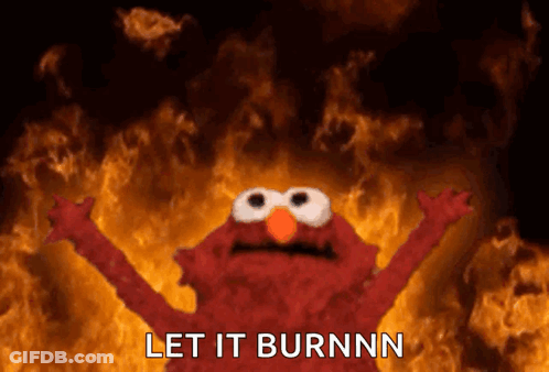 Elmo From Sesame Street Says Let It Burnnn In Front Of Flames GIF