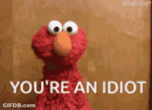 Elmo From Sesame Street Says " You 'Re An Idiot " In Front Of A Brown Background GIF