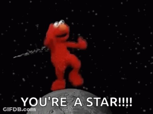 Elmo From Sesame Street Standing On Rock In Space GIF