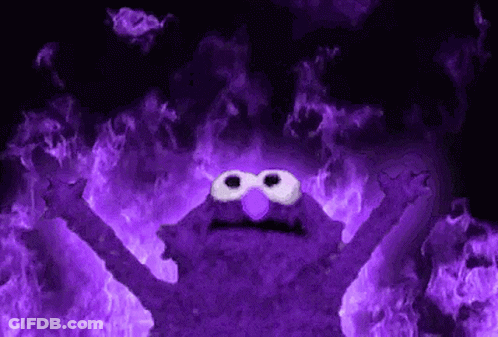 Elmo From Sesame Street Surrounded By Purple Flames GIF