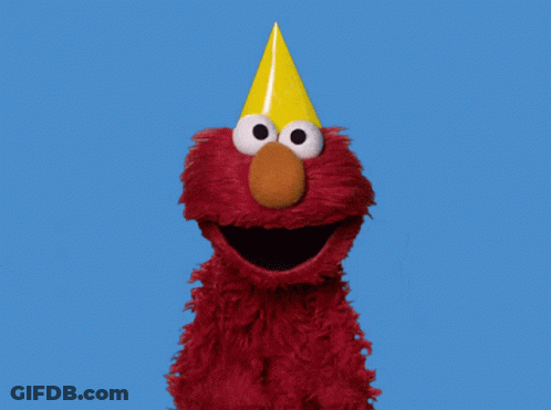 Elmo From Sesame Street With His Mouth Open Against A Blue Sky GIF